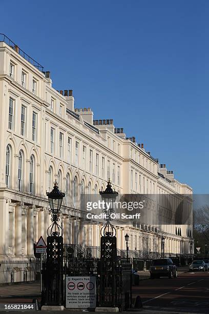 The sun shines over a terrace of residential properties in an affluent area of London adjacent to Regents Park on April 6, 2013 in London, England....