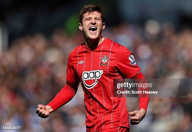 Adam Lallana of Southampton celebrates scoring his side's second goal during the Barclays Premier League match between Reading and Southampton at the...