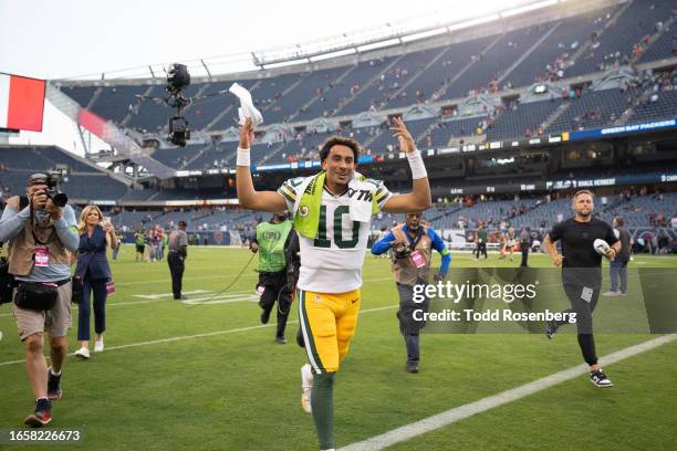 Quarterback Jordan Love of the Green Bay Packers celebrates as he leaves the field following the Packers' 38-20 win against the Chicago Bears after...