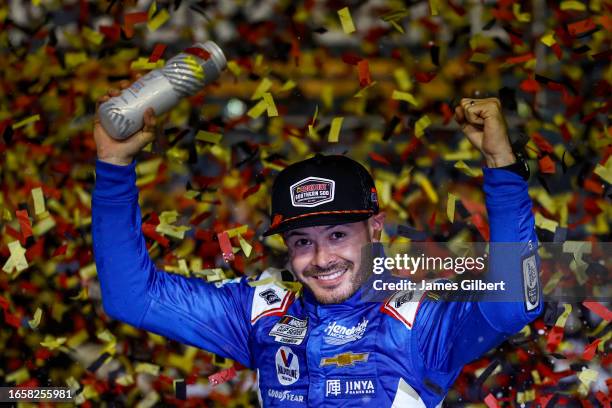 Kyle Larson, driver of the HendrickCars.com Chevrolet, celebrates in victory lane after winning the NASCAR Cup Series Cook Out Southern 500 at...