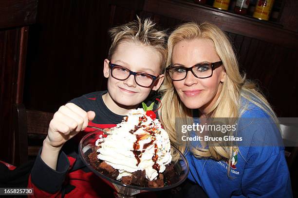 Evan Joseph Asher and mother Jenny McCarthy visit Buca di Beppo in Times Square on April 5, 2013 in New York City.