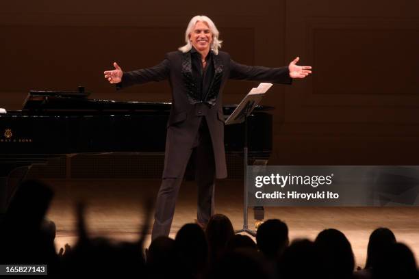 The baritone Dmitri Hvorostovsky, accompanied by Ivari Ilja on piano, performed the songs by Rachmaninoff and Georgy Sviridov at Carnegie Hall on...