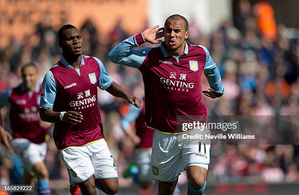 Gabriel Agbonlahor of Aston Villa celebrates his goal for Aston Villa during the Barclays Premier League match between Stoke City and Aston Villa at...