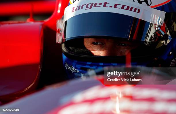 Scott Dixon of New Zealand, driver of the Target Chip Ganassi Racing Honda sits in his car during practice for the Honda Indy Grand Prix of Alabama...