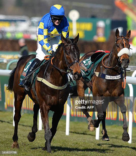 Auroras Encore ridden by Ryan Mania wins the Grand National horse race at Aintree Racecourse in Liverpool, north-west England, on April 6, 2013. The...