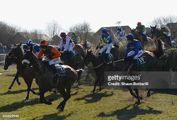 Winner Auroras Encore riden by Ryan Mania clears Becher's Brook during the John Smith's Grand National Steeple Chase at Aintree Racecourse on April...