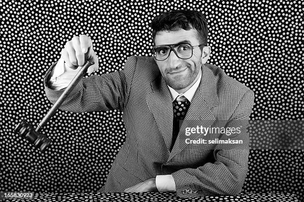 psycho hypnotist swinging gavel for justice system - hypnotist stock pictures, royalty-free photos & images