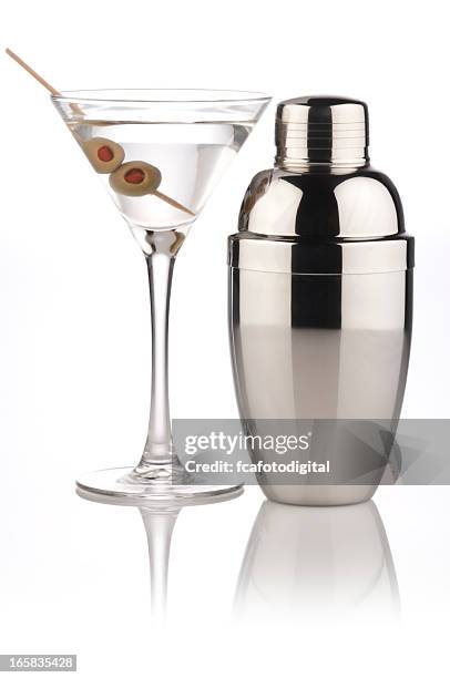 a martini and a metallic shaker - cocktail shaker stock pictures, royalty-free photos & images