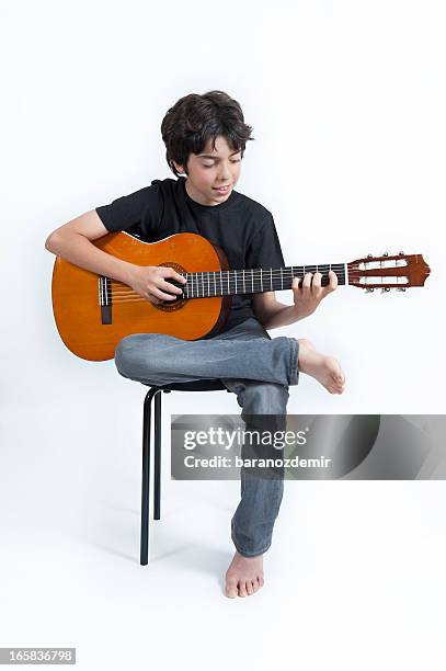 young guitar player - acoustic guitar white background stock pictures, royalty-free photos & images
