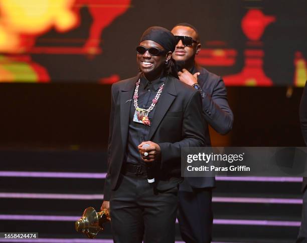 Recording artist Rema accepts the Best Male Artiste award during The 16th Headies Awards at Cobb Energy Performing Arts Centre on September 03, 2023...