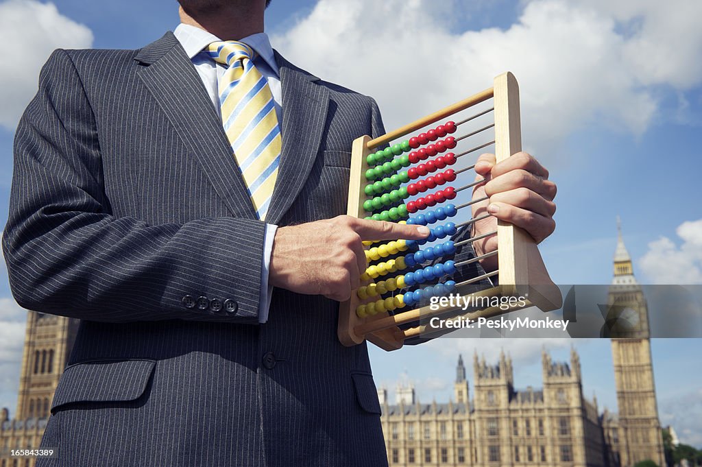 Returning Officer Holds Abacus at Houses of Parliament