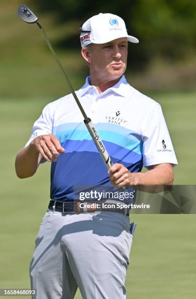 Golfer David Toms reacts after he just misses his putt on the green during the final round of the PGA Tour Champions Ascension Charity Classic on...