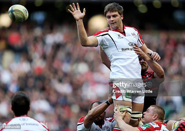 Iain Henderson of Ulster wins lineout ball under pressure from Will Fraser of Saracens during the Heineken Cup quarter final match between Saracens...