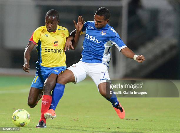 Mabina of Petro de Luanda and Kermit Erasmus of SuperSport during the CAF Confedaration Cup match between SuperSport United and Petro de Luanda at...