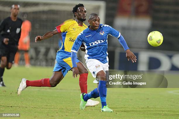 Chara of Petro de Luanda and George Maluleka of SuperSport during the CAF Confedaration Cup match between SuperSport United and Petro de Luanda at...