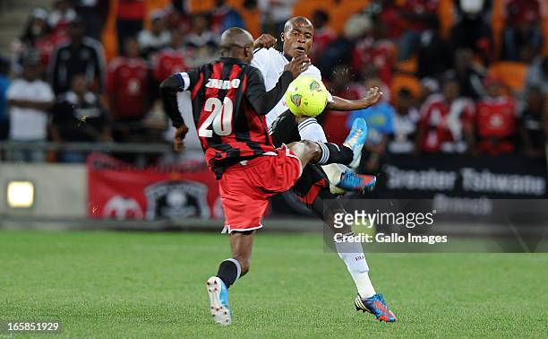 Thabo Matlaba of Orlando pirates battling for the ball with Henry Banda of Zanaco FC during the CAF Confedaration Cup match between Orlando Pirates...