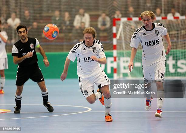 Florian Dondorf of Muenster runs with the ball during the DFB Futsal Cup final match between Hamburg Panthers and UFC Muenster at Sporthalle Wandsbek...