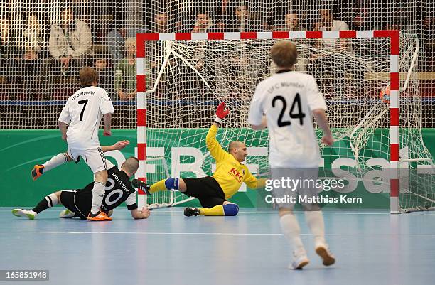 Florian Dondorf of Muenster scores the first goal during the DFB Futsal Cup final match between Hamburg Panthers and UFC Muenster at Sporthalle...