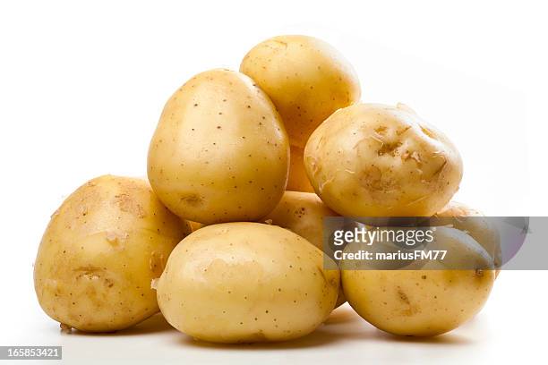 a pile of small yellow potatoes - raw potato 個照片及圖片檔