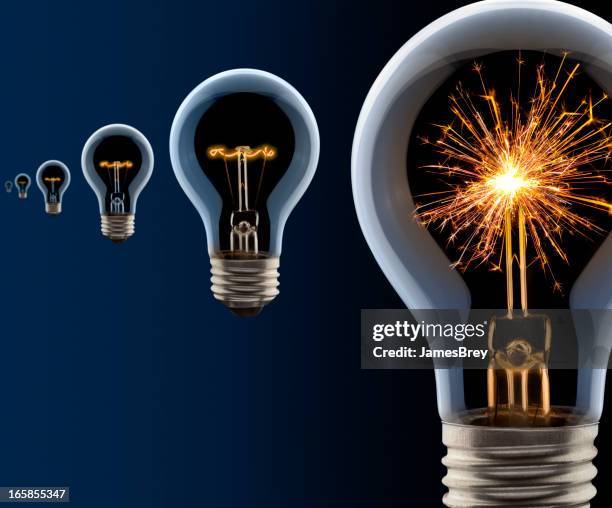 the hottest new idea of them all! - lightbulbs in a row stock pictures, royalty-free photos & images