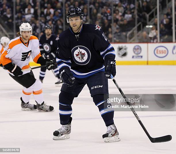 Aaron Gagnon of the Winnipeg Jets skates on the ice during second period in a game between the Winnipeg Jets and the Philadelphia Flyers on April 6,...