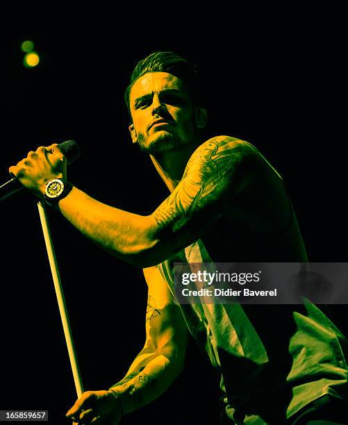 French singer and model Baptiste Giabiconi performs on stage before Joe Cocker's concert at Palais Nikaia on April 6, 2013 in Nice, France.