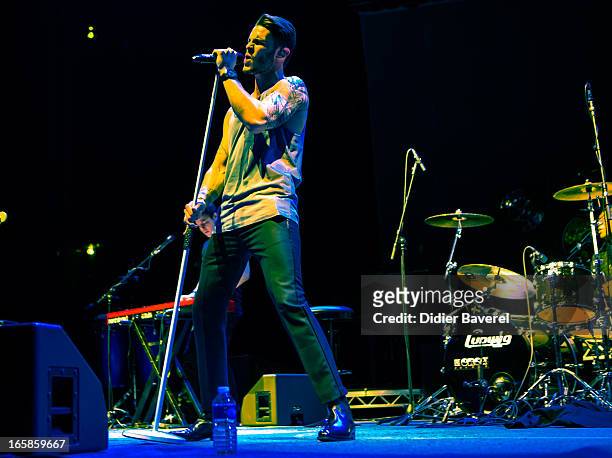 French singer and model Baptiste Giabiconi performs on stage before Joe Cocker's concert at Palais Nikaia on April 6, 2013 in Nice, France.