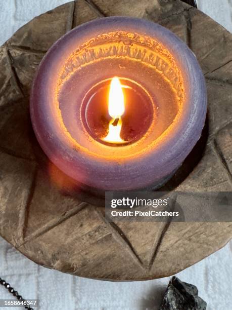 burning scented candle - candle overhead stock pictures, royalty-free photos & images