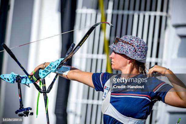 In this handout image provided by the World Archery Federation, Lisa Barbelin of France during the Women's recurve finals during the Hyundai Archery...