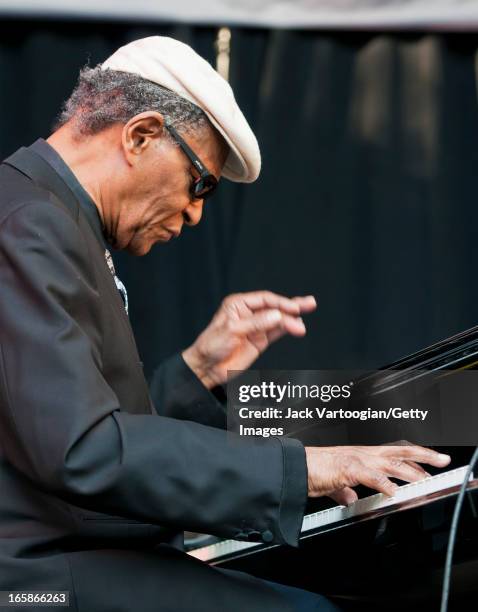 American jazz pianist McCoy Tyner performs at the 18th Annual Charlie Parker Jazz Festival in Harlem's Marcus Garvey Park, New York, New York, August...