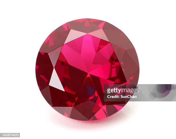 a shiny red ruby gemstone on a white background - gem stock pictures, royalty-free photos & images