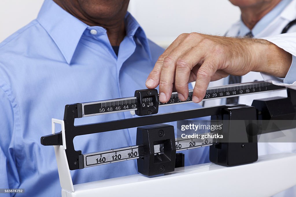 Doctor Checking Weight