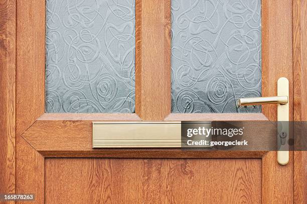 front door close-up - handle stock pictures, royalty-free photos & images