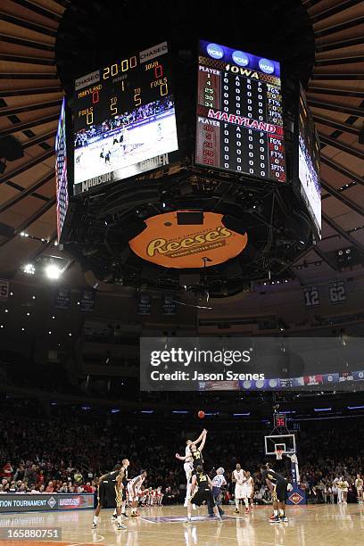 The Maryland Terapins and the Iowa Hawkeyes at tipoff during the 2013 NIT Championship - Semifinals at the Madison Square Garden on April 2, 2013 in...