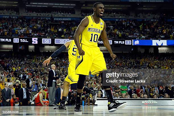 Tim Hardaway Jr. #10 of the Michigan Wolverines celebrates after they won 61-56 against the Syracuse Orange during the 2013 NCAA Men's Final Four...