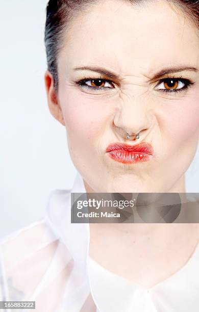 woman pouting - body piercings 個照片及圖片檔