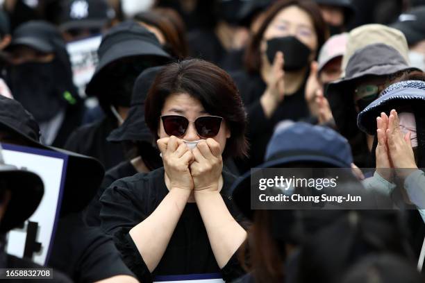 South Korean teachers participate in a rally in front of National Assembly on September 04, 2023 in Seoul, South Korea. School teachers hold a...