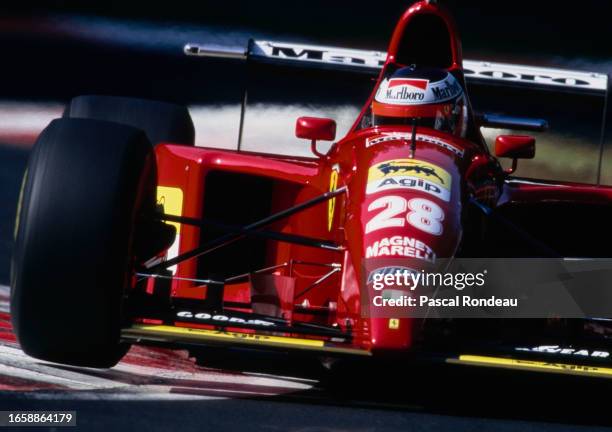 Gerhard Berger from Austria drives the#28 Scuderia Ferrari Ferrari 412T2 Ferrari V12 during the Formula One Italian Grand Prix on 10th September 1995...