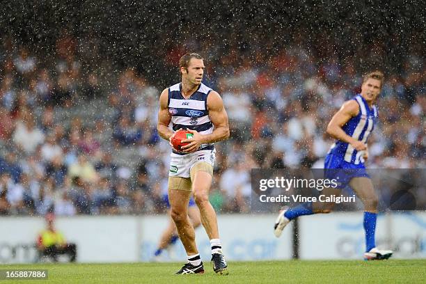 Joel Corey of the Cats marks the ball during the round two AFL match between the Geelong Cats and the North Melbourne Kangaroos at Etihad Stadium on...