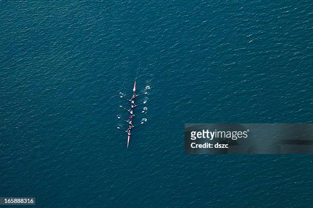 rowing scull boat on colorado river near austin texas - match sport stockfoto's en -beelden