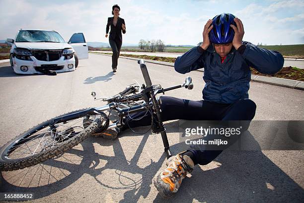 road accident. car and bicycle - misfortune stockfoto's en -beelden