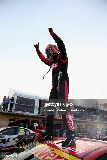 Fabian Coulthard driver of the Lockwood Racing Holden celebrates after winning race five of round two of the V8 Supercar Championship Series at...