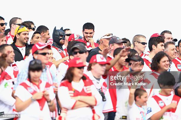 Dragons supporter dressed in a Batman mask watches on during the round five NRL match between the St George Illawarra Dragons and the Newcastle...