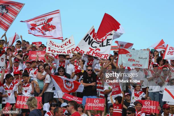 Dragons supporters cheer as their team takes the field for the round five NRL match between the St George Illawarra Dragons and the Newcastle Knights...