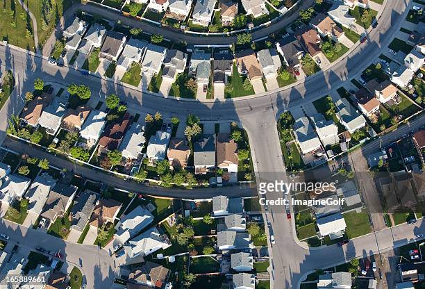 aerial of urban neighbourhood with residential community - suburbs stock pictures, royalty-free photos & images