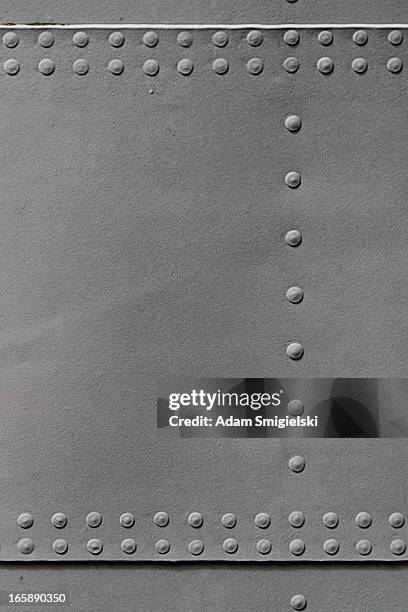 old metal texture with rivets - klinknagel stockfoto's en -beelden