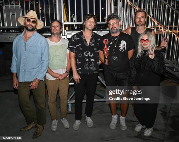 Jonathan Russell, Kenny Hensley, Tyler Williams, Chris Zasche, Charity Rose Thielen and Matt Gervais of The Head and the Heart portrait backstage at...