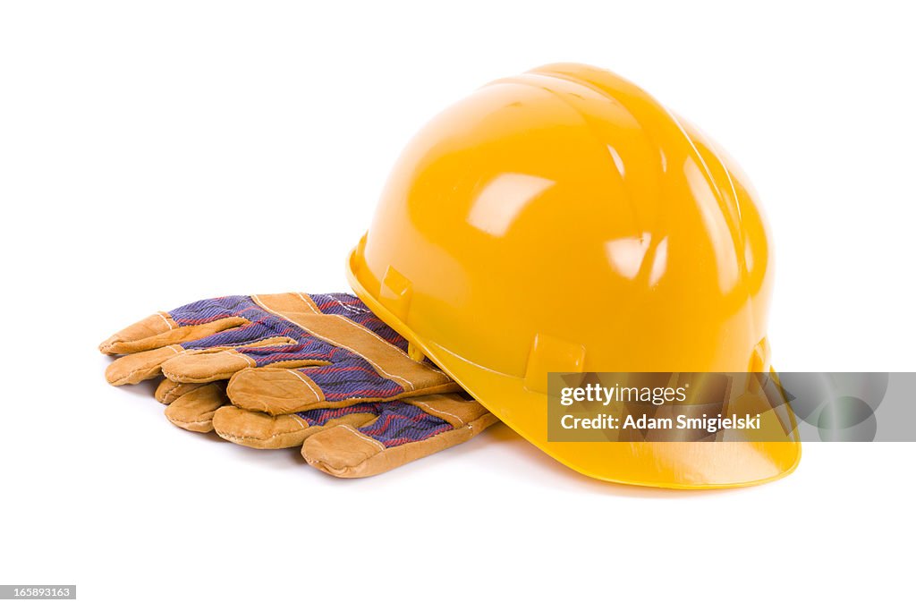 Orange hard hat with protective gloves