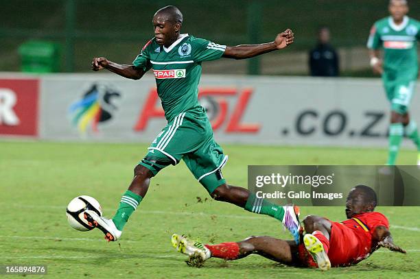 Dipsy Selolwane tackles Njabulo Manqana during the Absa Premiership match between University of Pretoria and AmaZulu at Tuks Stadium on April 06,...