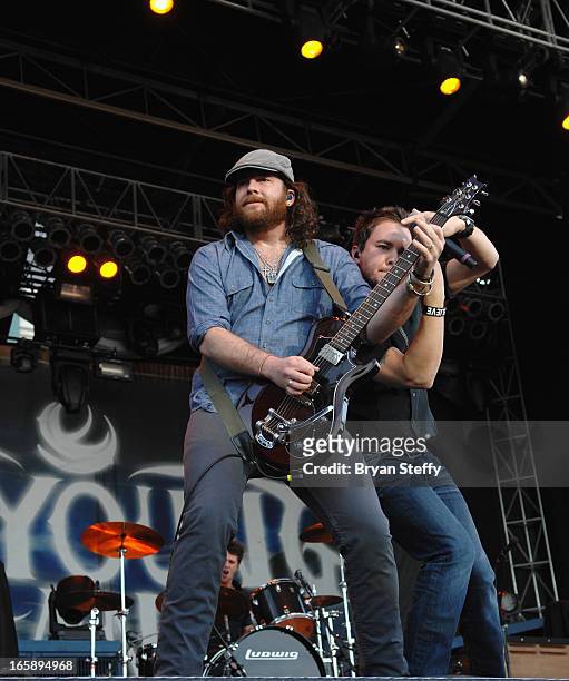 Guitarist James Young and musician Mike Eli of the Eli Young Band performs during the 48th Annual Academy Of Country Music Awards Party for a Cause...